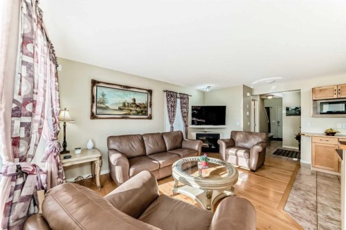 116 Hidden Creek Rise Nw, Calgary, AB - Indoor Photo Showing Living Room