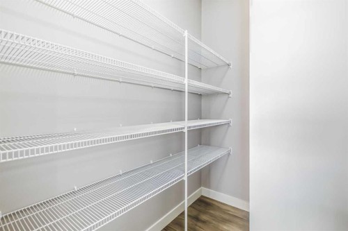 4 Topaz Place, Cochrane, AB - Indoor With Storage