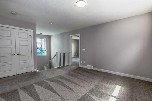 4 Topaz Place, Cochrane, AB - Indoor Photo Showing Other Room