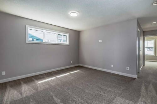 4 Topaz Place, Cochrane, AB - Indoor Photo Showing Other Room
