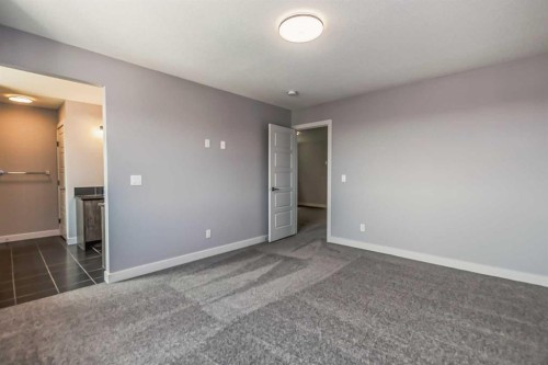 4 Topaz Place, Cochrane, AB - Indoor Photo Showing Other Room