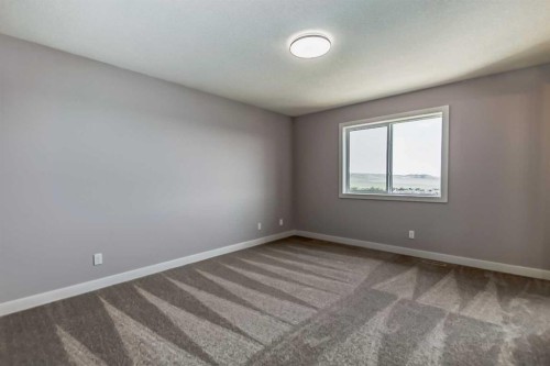 4 Topaz Place, Cochrane, AB - Indoor Photo Showing Other Room
