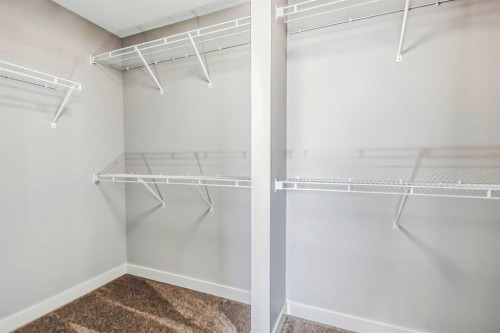 4 Topaz Place, Cochrane, AB - Indoor With Storage