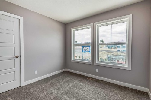 4 Topaz Place, Cochrane, AB - Indoor Photo Showing Other Room