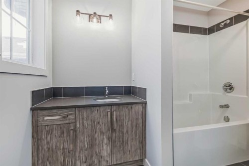 4 Topaz Place, Cochrane, AB - Indoor Photo Showing Bathroom