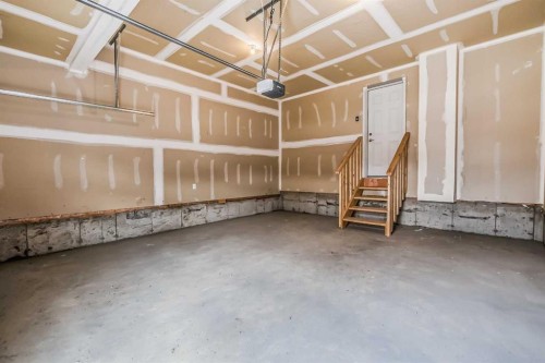 4 Topaz Place, Cochrane, AB - Indoor Photo Showing Garage