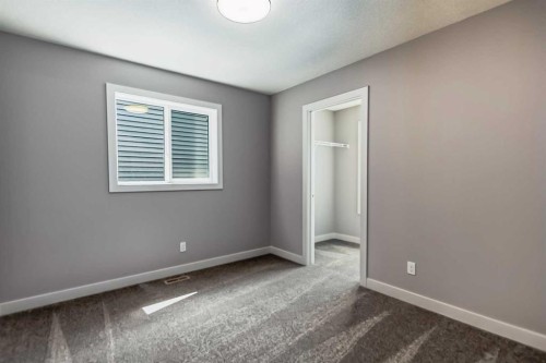 4 Topaz Place, Cochrane, AB - Indoor Photo Showing Other Room