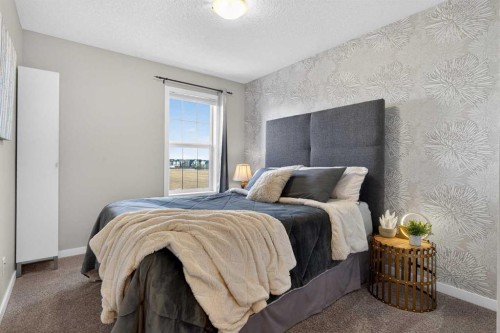 317 Legacy Boulevard Se, Calgary, AB - Indoor Photo Showing Bedroom