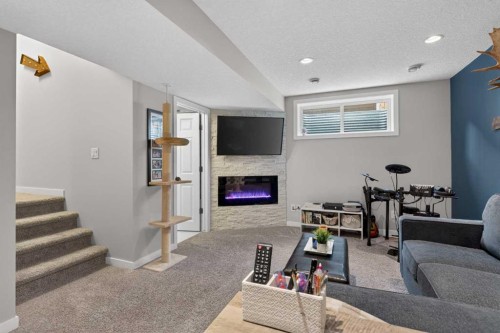 317 Legacy Boulevard Se, Calgary, AB - Indoor With Fireplace