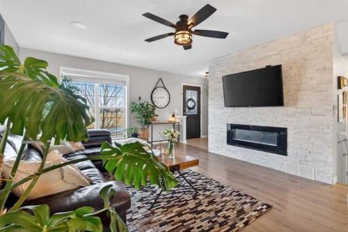 317 Legacy Boulevard Se, Calgary, AB - Indoor Photo Showing Living Room With Fireplace