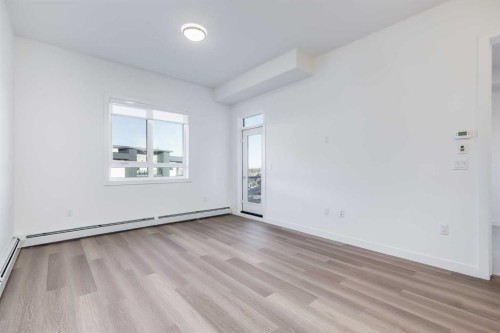 1414-520 Reynolds Avenue Sw, Airdrie, AB - Indoor Photo Showing Other Room
