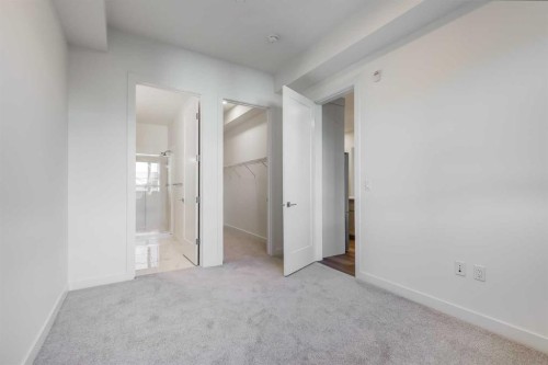 1414-520 Reynolds Avenue Sw, Airdrie, AB - Indoor Photo Showing Other Room