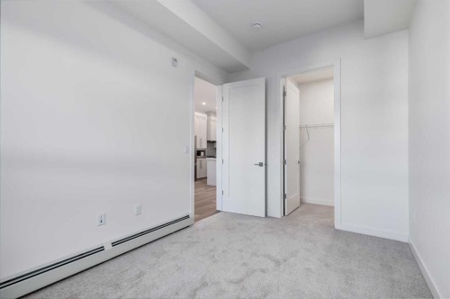 1414-520 Reynolds Avenue Sw, Airdrie, AB - Indoor Photo Showing Other Room