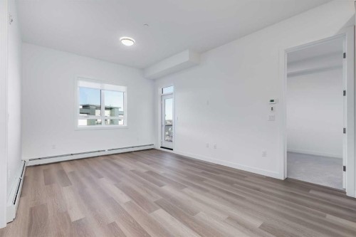 1414-520 Reynolds Avenue Sw, Airdrie, AB - Indoor Photo Showing Other Room