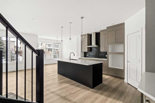 71 Silver Spruce Grove Sw, Calgary, AB - Indoor Photo Showing Kitchen With Upgraded Kitchen