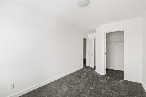 71 Silver Spruce Grove Sw, Calgary, AB - Indoor Photo Showing Other Room