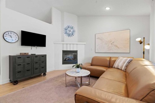 140 Allen Crescent, Vulcan, AB - Indoor Photo Showing Living Room With Fireplace