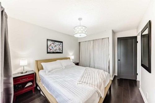 12 Taraglen Road Ne, Calgary, AB - Indoor Photo Showing Bedroom