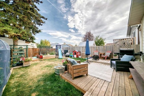 12 Taraglen Road Ne, Calgary, AB - Outdoor With Deck Patio Veranda