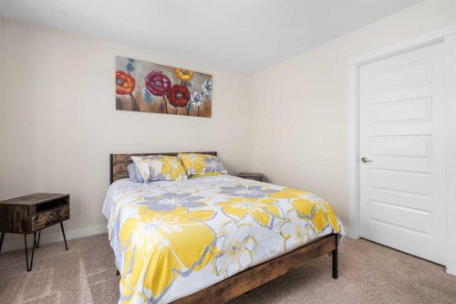 75 Williamstown Landing Nw, Airdrie, AB - Indoor Photo Showing Bedroom