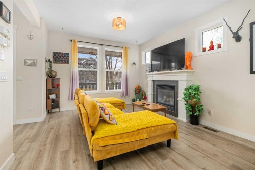 75 Williamstown Landing Nw, Airdrie, AB - Indoor Photo Showing Living Room With Fireplace