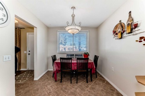 208 Bracewood Road Sw, Calgary, AB - Indoor Photo Showing Dining Room