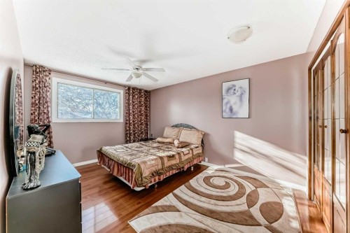 208 Bracewood Road Sw, Calgary, AB - Indoor Photo Showing Bedroom