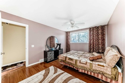 208 Bracewood Road Sw, Calgary, AB - Indoor Photo Showing Bedroom