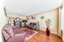 208 Bracewood Road Sw, Calgary, AB  - Indoor Photo Showing Living Room 