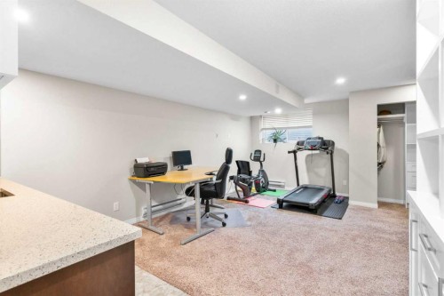 50 Legacy Glen Common Se, Calgary, AB - Indoor Photo Showing Gym Room