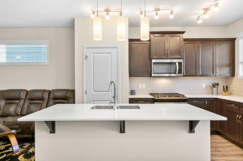 50 Legacy Glen Common Se, Calgary, AB - Indoor Photo Showing Kitchen With Double Sink With Upgraded Kitchen