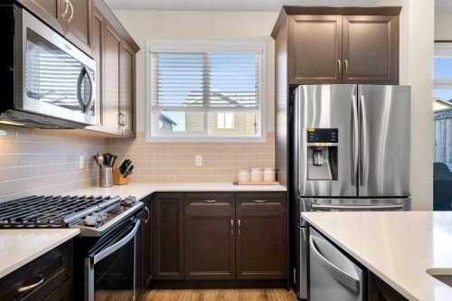 50 Legacy Glen Common Se, Calgary, AB - Indoor Photo Showing Kitchen With Upgraded Kitchen