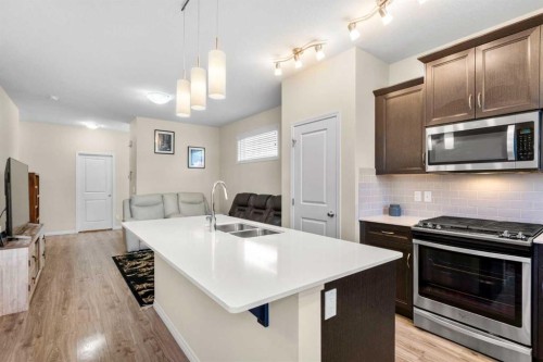 50 Legacy Glen Common Se, Calgary, AB - Indoor Photo Showing Kitchen With Double Sink With Upgraded Kitchen