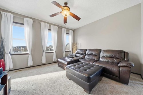 65 Elgin Meadows Circle Se, Calgary, AB - Indoor Photo Showing Living Room