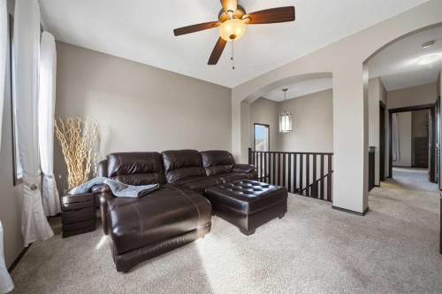 65 Elgin Meadows Circle Se, Calgary, AB - Indoor Photo Showing Living Room