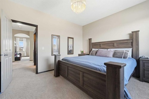 65 Elgin Meadows Circle Se, Calgary, AB - Indoor Photo Showing Bedroom