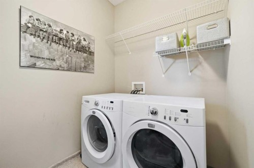 65 Elgin Meadows Circle Se, Calgary, AB - Indoor Photo Showing Laundry Room