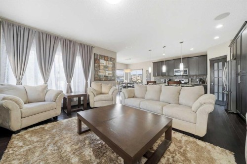 65 Elgin Meadows Circle Se, Calgary, AB - Indoor Photo Showing Living Room