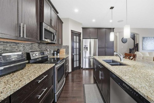 65 Elgin Meadows Circle Se, Calgary, AB - Indoor Photo Showing Kitchen With Stainless Steel Kitchen With Double Sink With Upgraded Kitchen