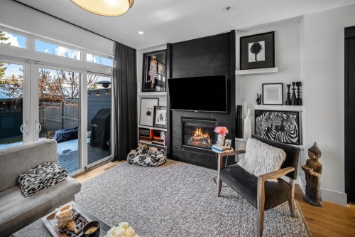 1910 48 Avenue Sw, Calgary, AB - Indoor With Fireplace