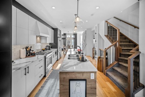 1910 48 Avenue Sw, Calgary, AB - Indoor Photo Showing Kitchen With Double Sink With Upgraded Kitchen