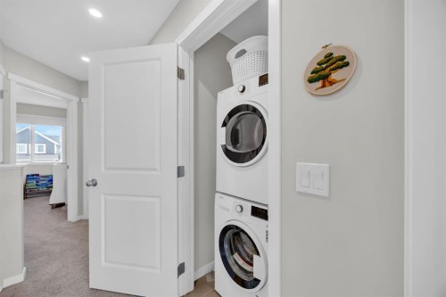 954 Mahogany Boulevard Se, Calgary, AB - Indoor Photo Showing Laundry Room