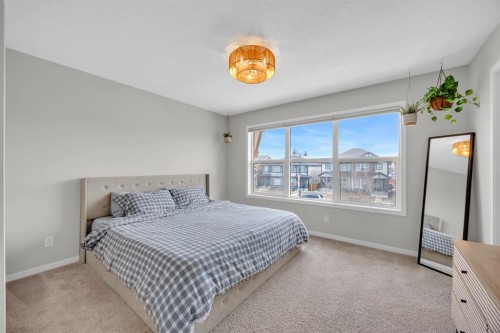 954 Mahogany Boulevard Se, Calgary, AB - Indoor Photo Showing Bedroom