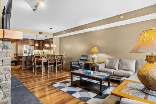 112-379 Spring Creek Drive, Canmore, AB - Indoor Photo Showing Living Room