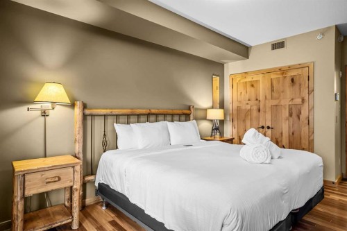 112-379 Spring Creek Drive, Canmore, AB - Indoor Photo Showing Bedroom