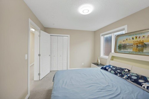 93 Saddlestone Place Ne, Calgary, AB - Indoor Photo Showing Bedroom