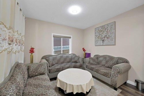 93 Saddlestone Place Ne, Calgary, AB - Indoor Photo Showing Living Room