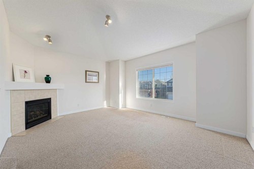 320 Citadel Meadow Bay Nw, Calgary, AB - Indoor Photo Showing Other Room With Fireplace