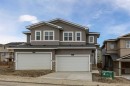 90 Heritage Circle, Cochrane, AB  - Outdoor With Facade 