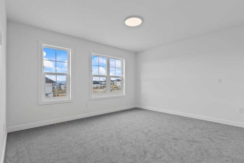 90 Heritage Circle, Cochrane, AB - Indoor Photo Showing Other Room